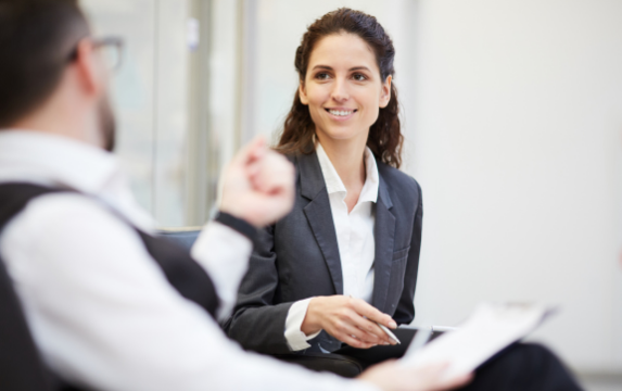 Woman learns about her financial plan from a financial professional.