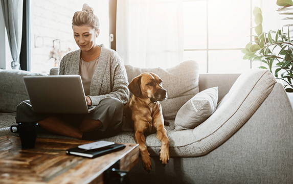 Advisor working from home with pet