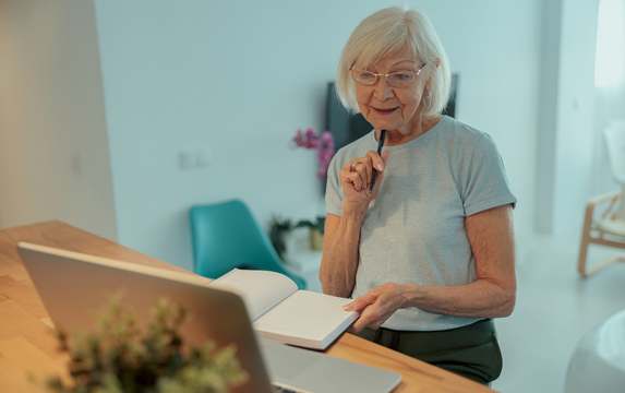 Retiree attending an online webinar