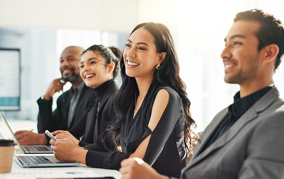 A group of financial professionals in a meeting.