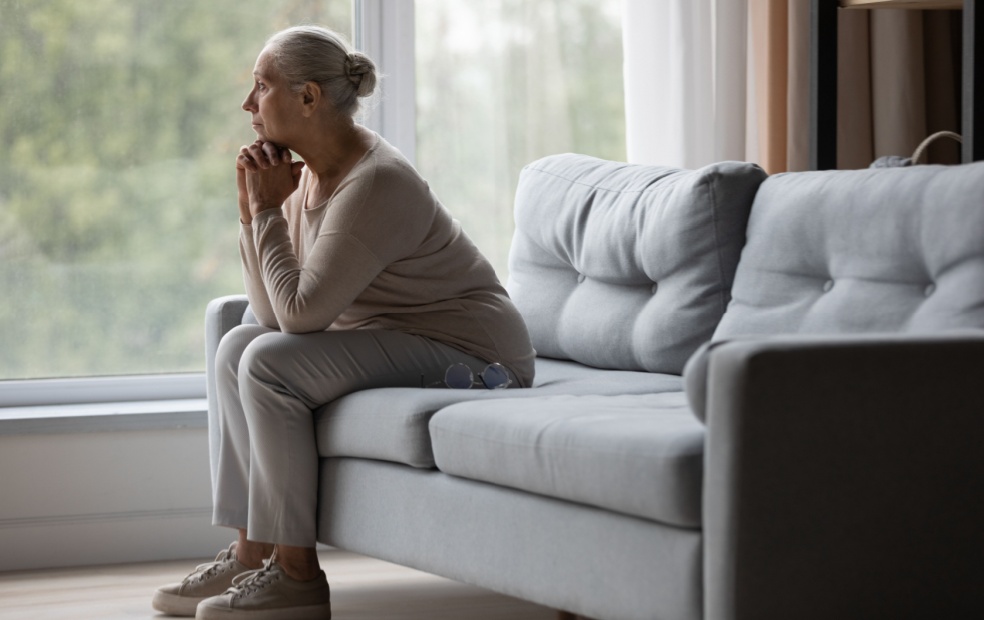 Older woman thinking about being alone