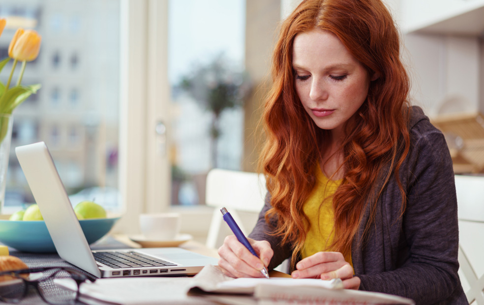 Young woman studying to become a financial planner