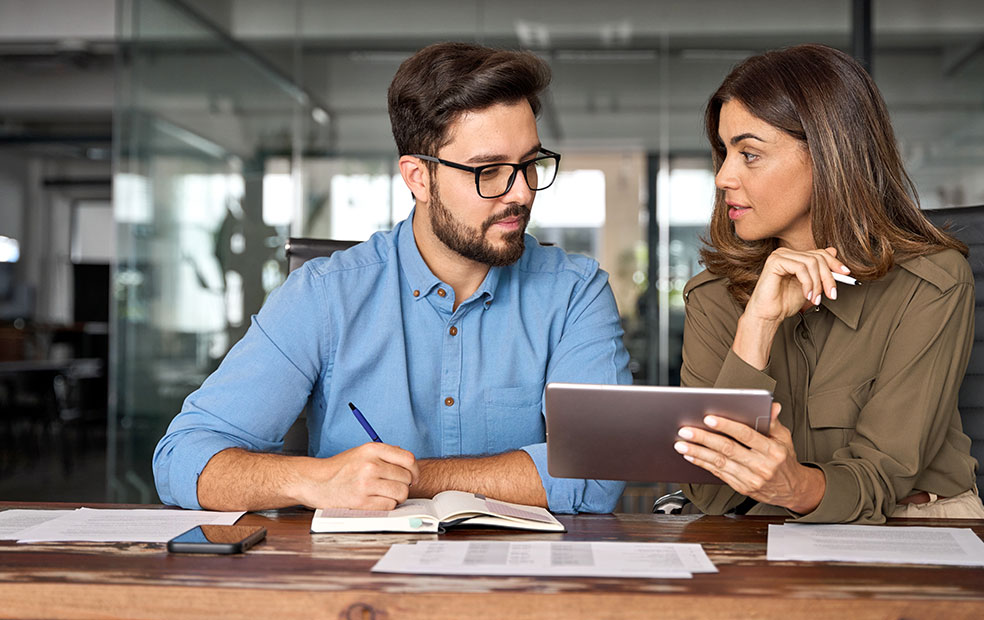 Financial planner collaborating with client