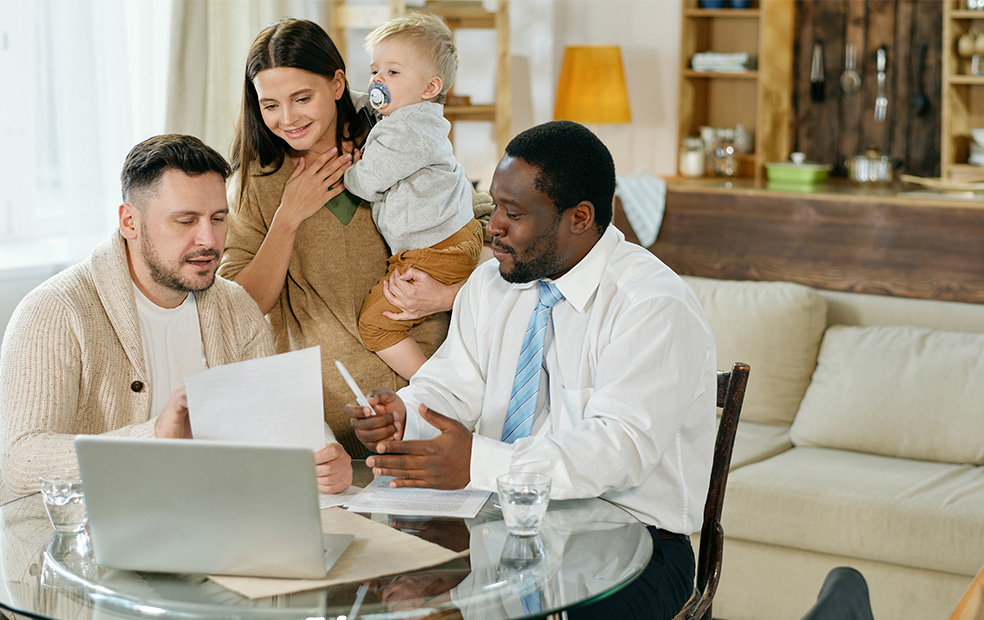 Advisor meeting with young family