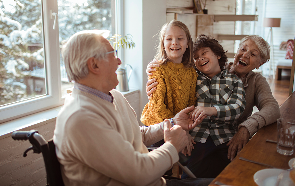 A grandfather enjoying time with his grandchildren.