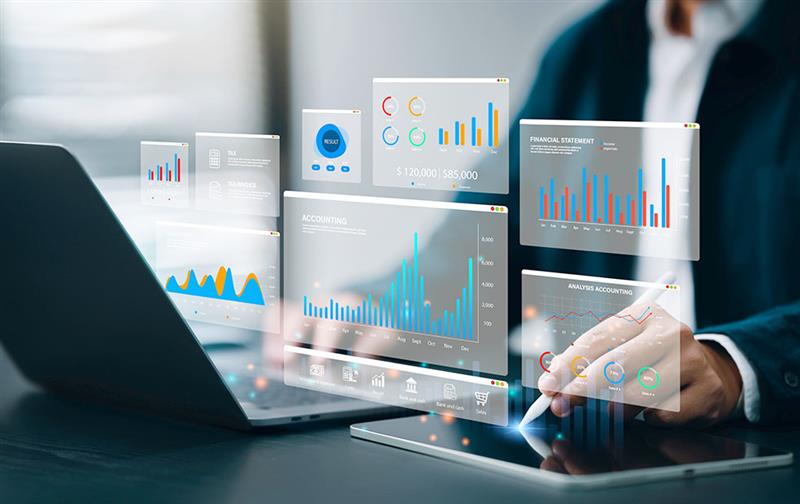 A financial planner working at a computer.