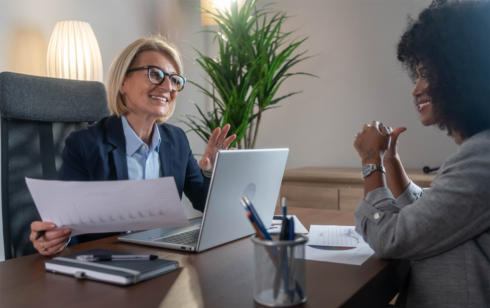 A financial planner meeting with a client.