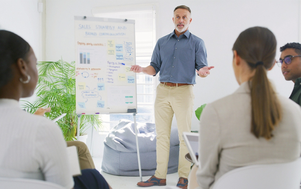Advisor Presenting a Connected Marketing and Financial Planning Strategy