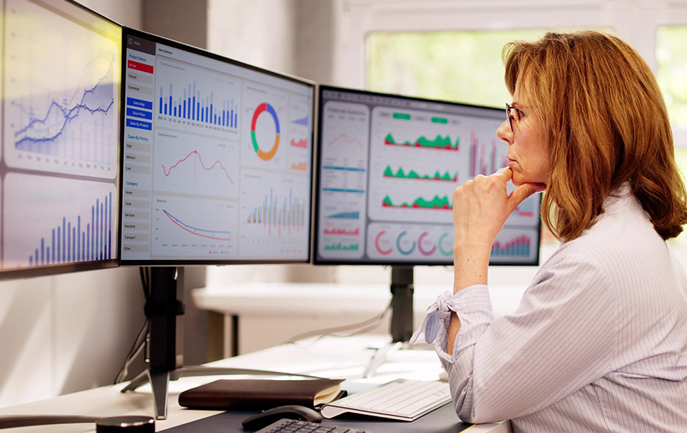 A financial planner working on a computer.