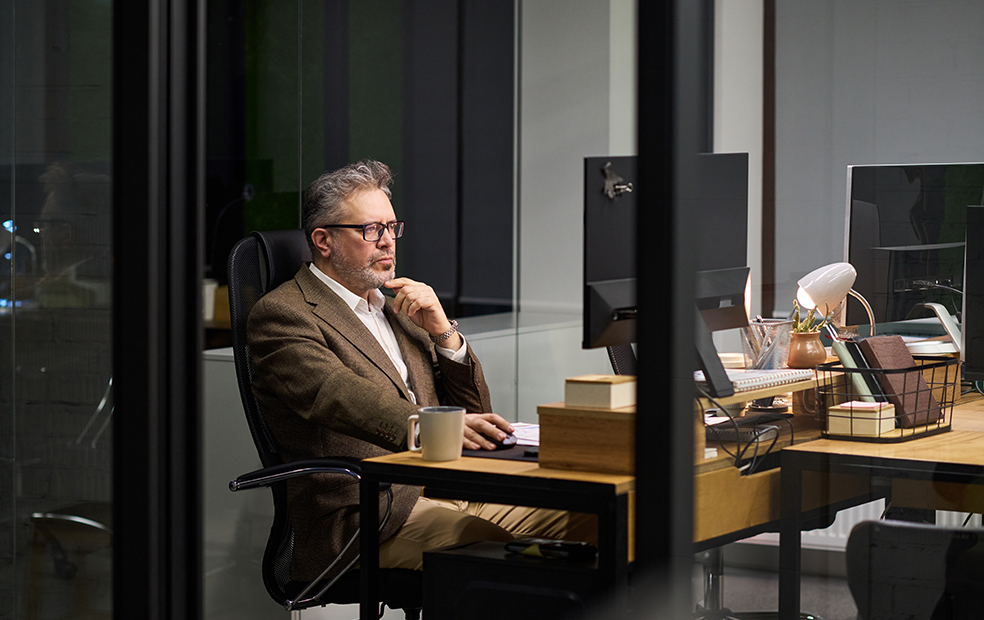 Busy financial advisor working late hours