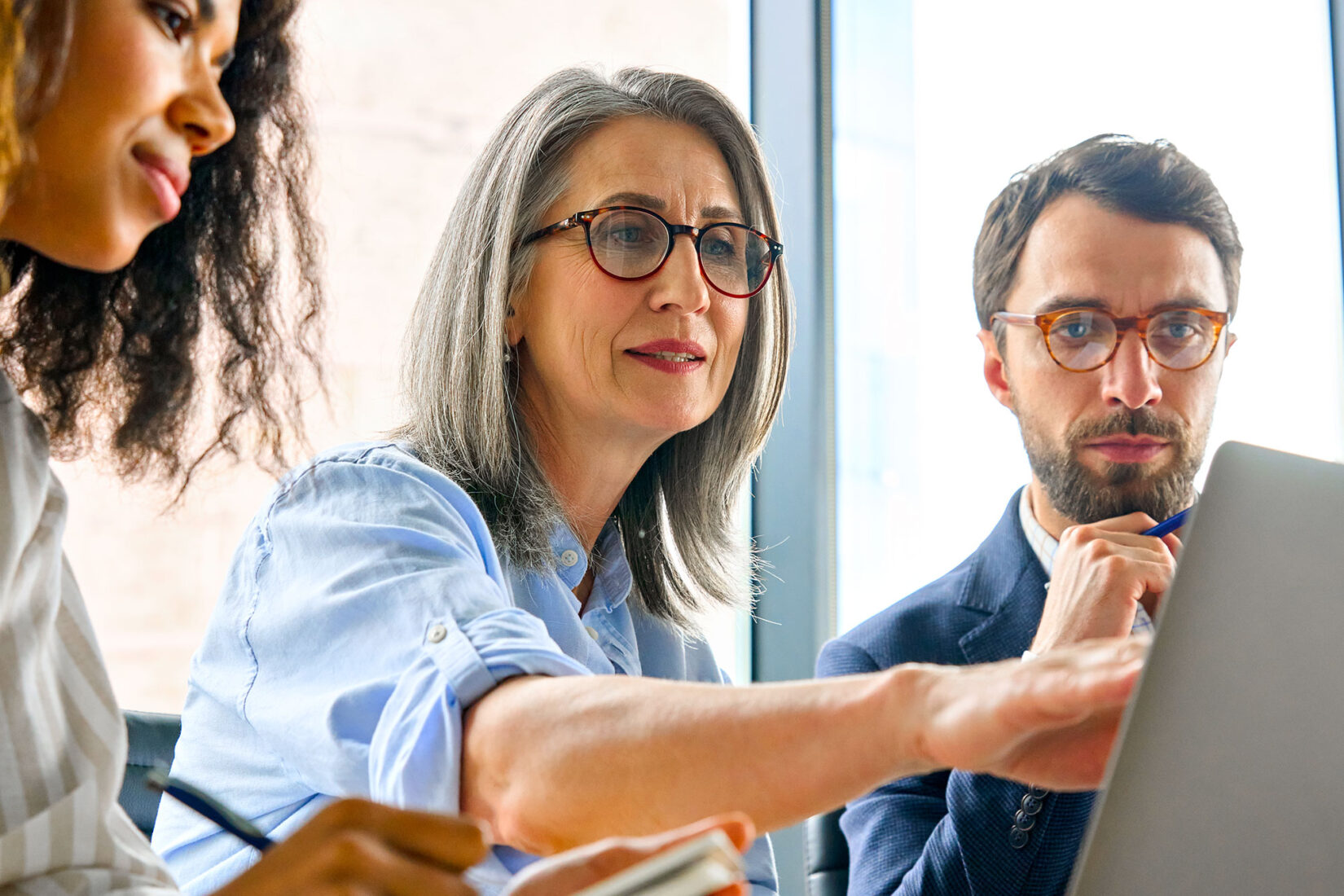 Woman training others on the eMoney platform