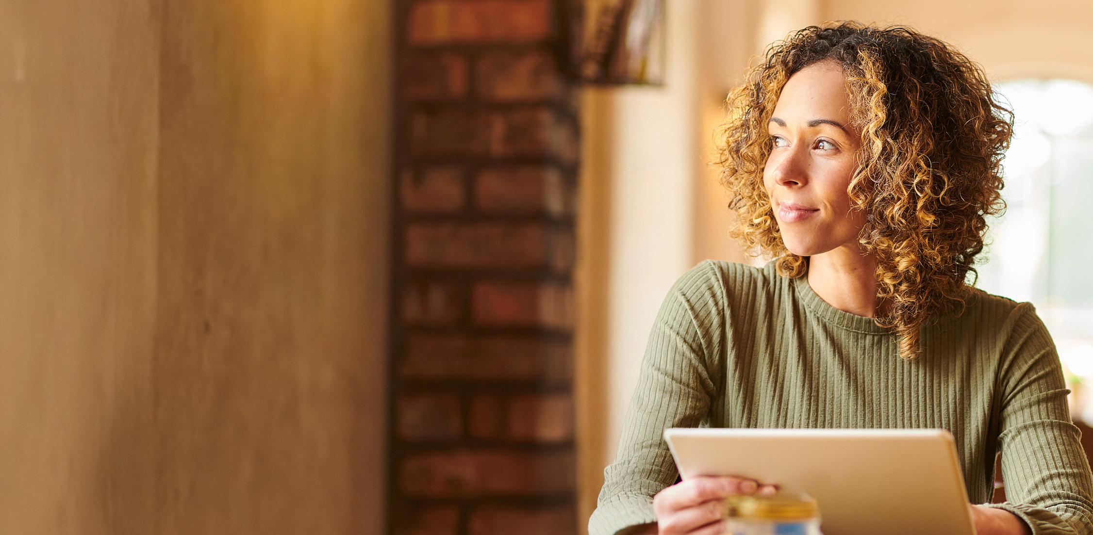 Person happily contemplating their future